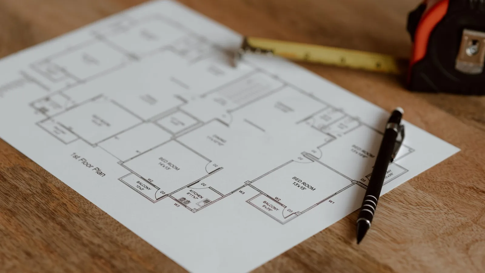 Architectural floor plan blueprint and project budget schedule for commercial interior fitout