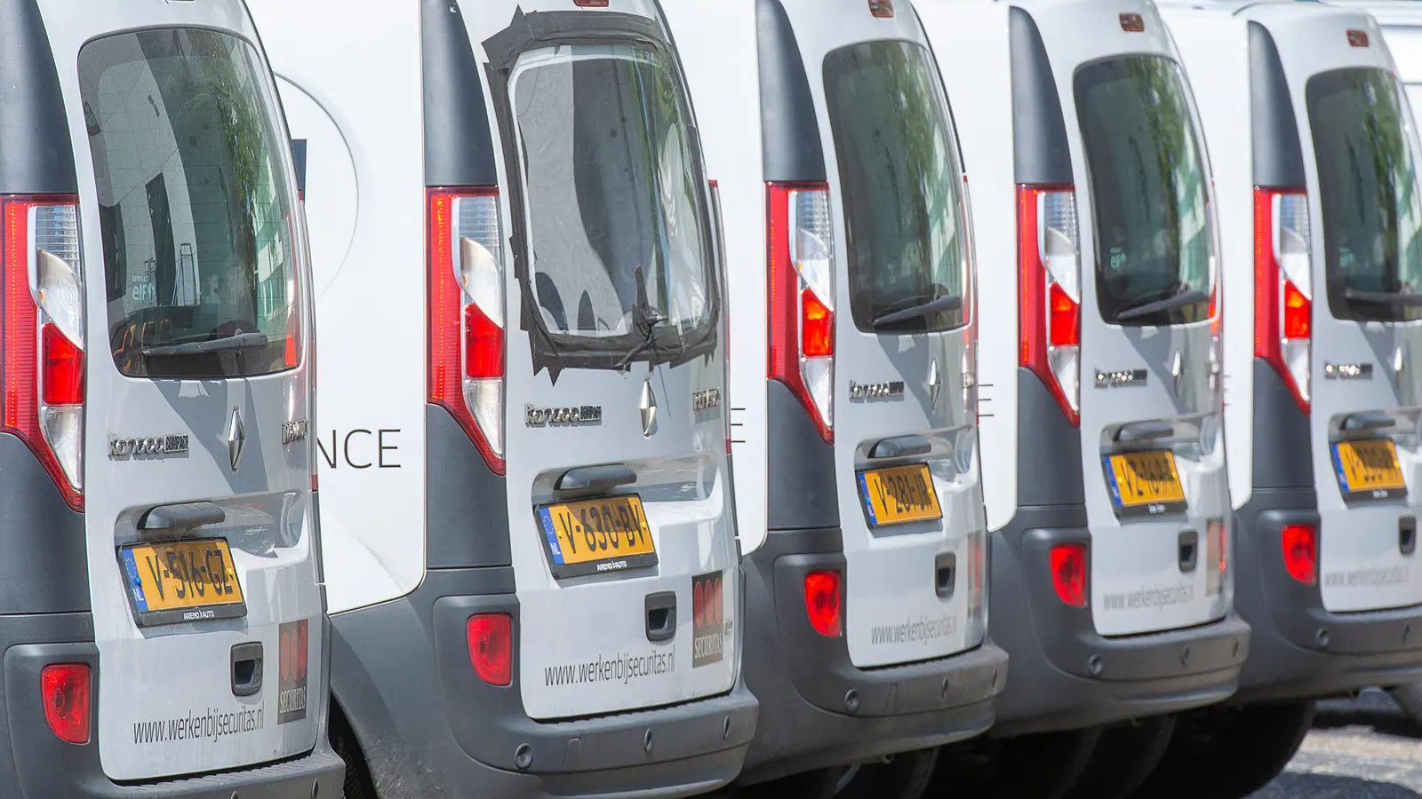 Fleet of white commercial vans parked in rows, the type of business vehicles funded through commercial vehicle finance in NZ