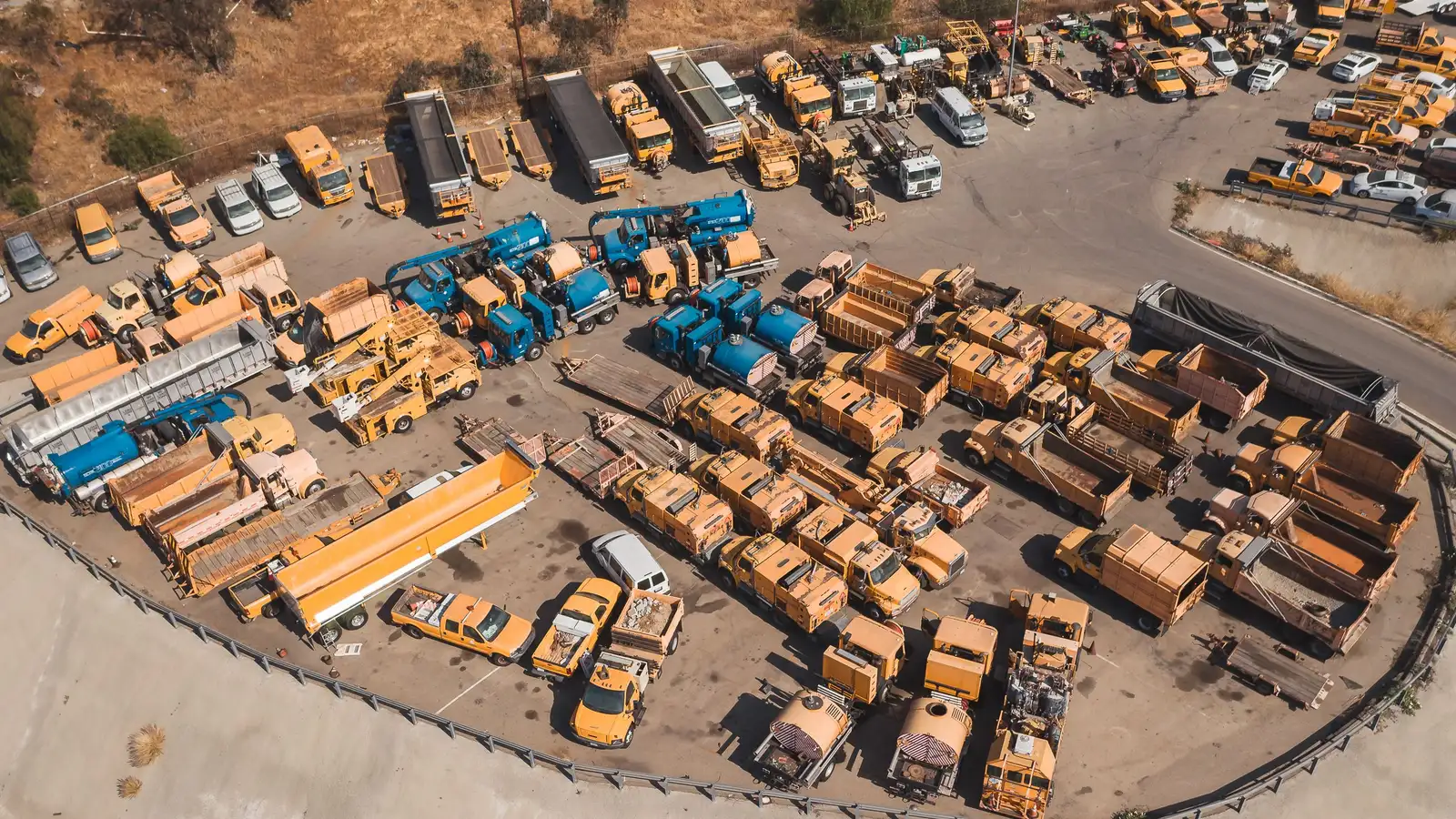 Assorted commercial vehicle types parked together in a lot, illustrating the range of vehicles commercial vehicle finance covers