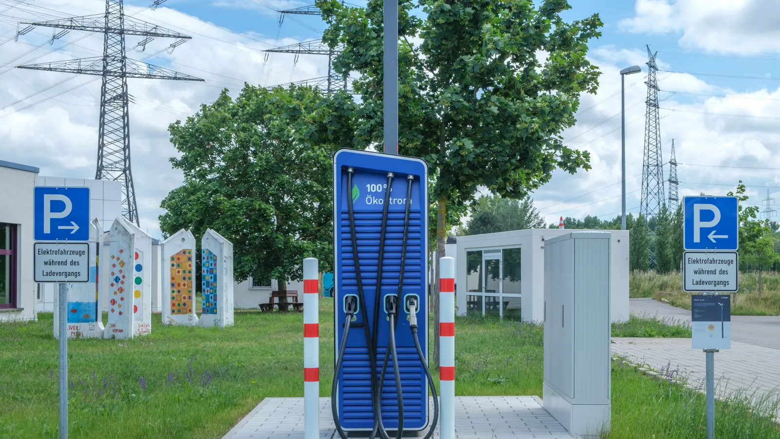 Electric vehicle plugged into a public charging station, the type of vehicle funded through electric vehicle finance