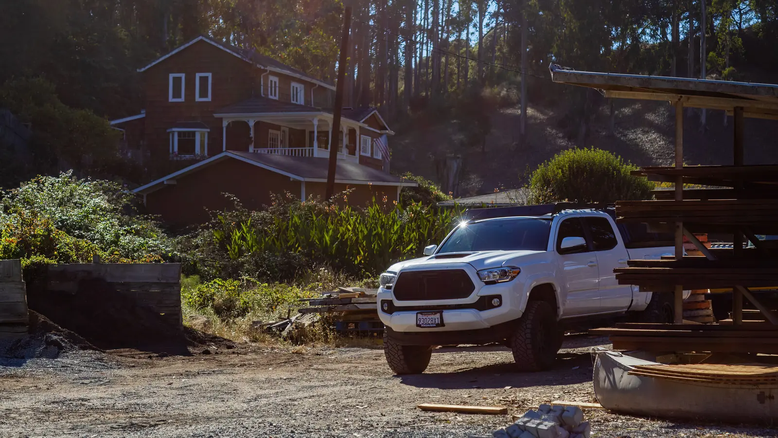 White pickup ute parked on a driveway, representing a new or used vehicle purchase for ute finance